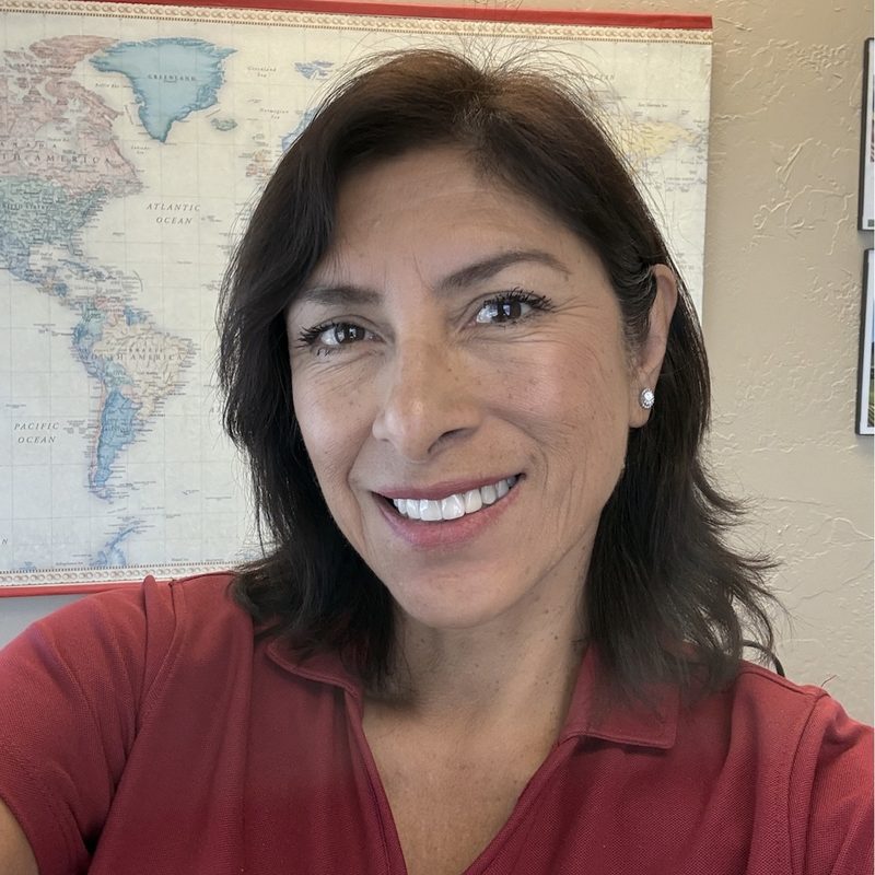 Portrait of Cessy Meacham, founder of Anytime Travel Solutions